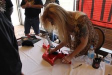 Lita signing Warlock.JPG Lita signing Warlock.JPG